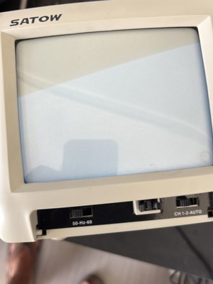 Satow portable TV device used with digital technology