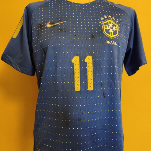 Brazil football jersey used, size M, with black ink stain