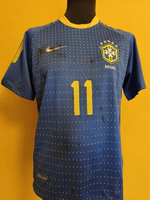 Brazil football jersey used, size M, with black ink stain