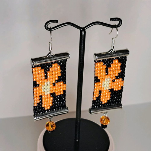 Handmade earrings new with daisies, knitted, black and orange