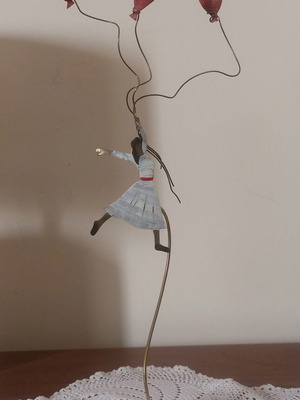 Handmade metal decorative girl with balloons like new