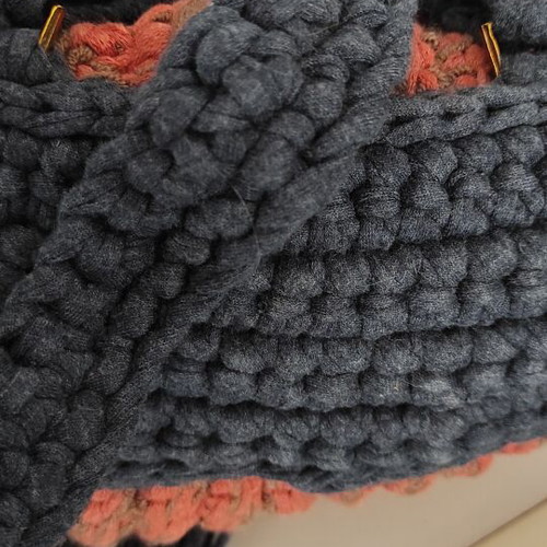 Knitted backpack like new, orange with leather hamsa detail