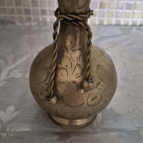 Vintage bronze vase used with engraved designs and rope detail