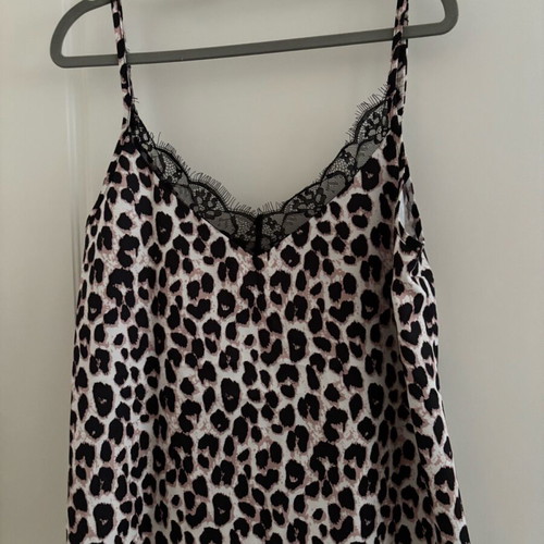Women's leopard print top like new with black lace