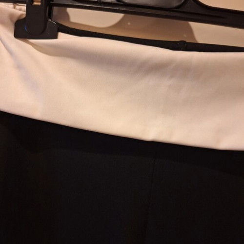 Elastic bell-bottom pants one size fits S and M like new, black and white