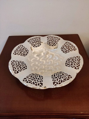 Silver-plated platter like new with scalloped edge and pierced patterns