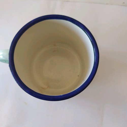 Enamel mug used, old with painted design