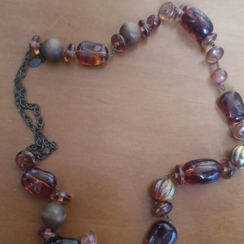 Necklace used with beads in various shapes and colors