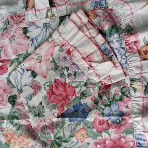 Figured pillowcases like new with dimensions 70x50 and ruffles