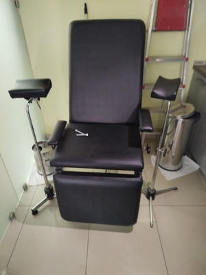 Medical phlebotomy chair used with replaced upholstery