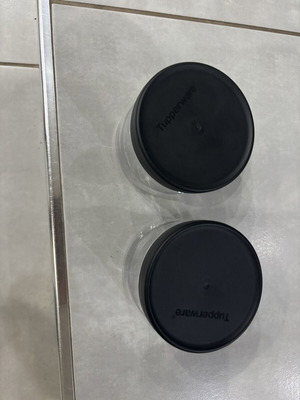 Tupperware bowl with integrated spoon in lid
