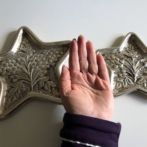 Silver star-shaped carved coasters set of 2 like new