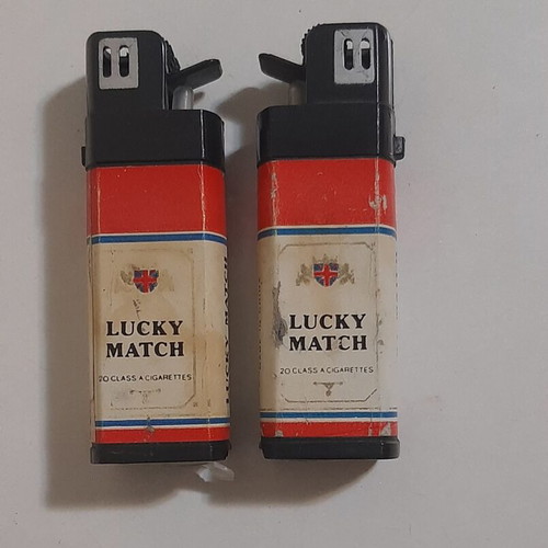 Vintage 80s squirting lighter set of 2 used prank toys