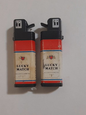 Vintage 80s squirting lighter set of 2 used prank toys