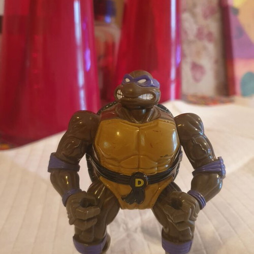 Donatello Ninja Turtles figure used with two Power Rangers gift