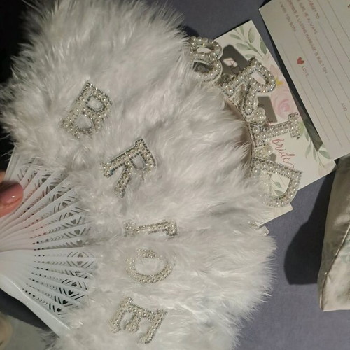 Bachelor accessories used, women's hair, fan, glasses
