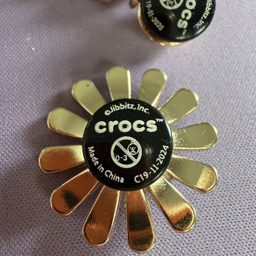 Crocs Jibbitz gold, like new
