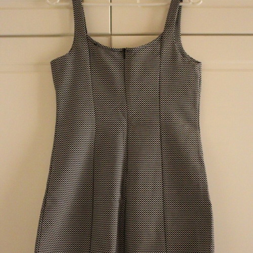 Fitted dress new, black and white, sizes S and M