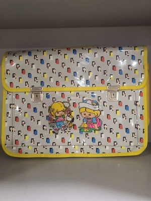 Vintage 1980s school bag with pixel pattern and girl figure