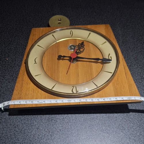 Mid-Century Modern wall clock like new with rope and wood