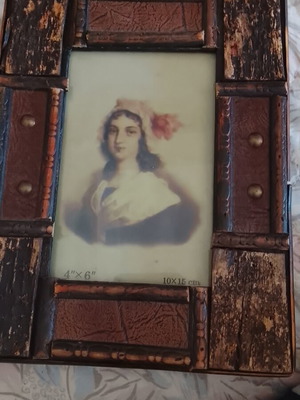 Vintage photo frames with wood, leather and brass