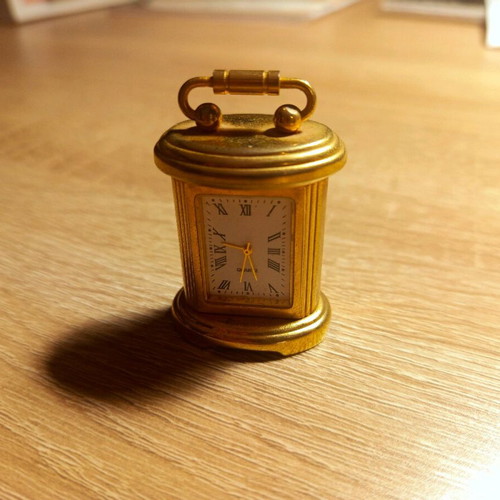 Vintage gold antique clock refurbished, analog tabletop