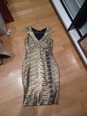 Dress gold size M, never worn