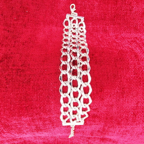 Steel bracelet with three chain rows like new, adjustable