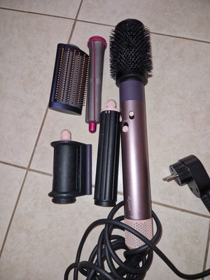 Dyson hair styler with attachments