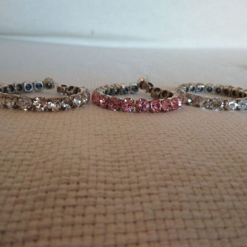 Set of three tennis bracelets like new, pink and white