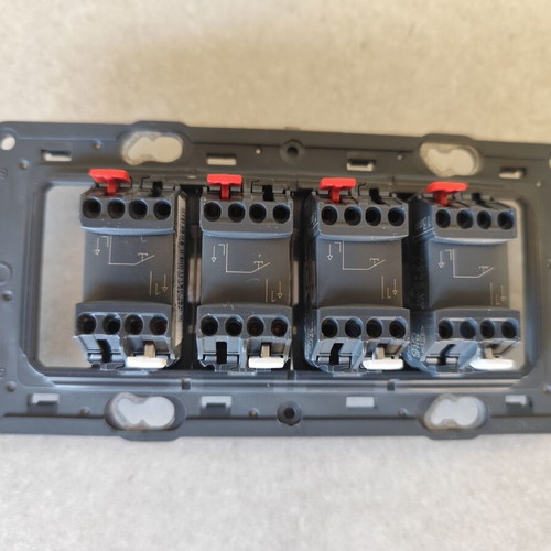Legrand outdoor wall case with 4 relay toggle switches like new
