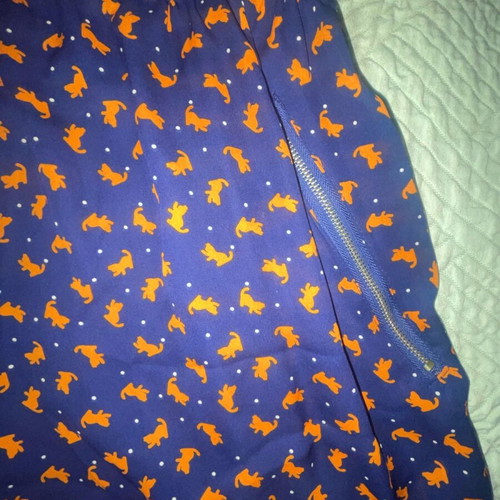 Vintage sleeveless mini dress like new with blue and orange prints