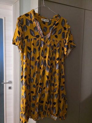 Moutaki dress used, mustard with floral and shape patterns, loose fit