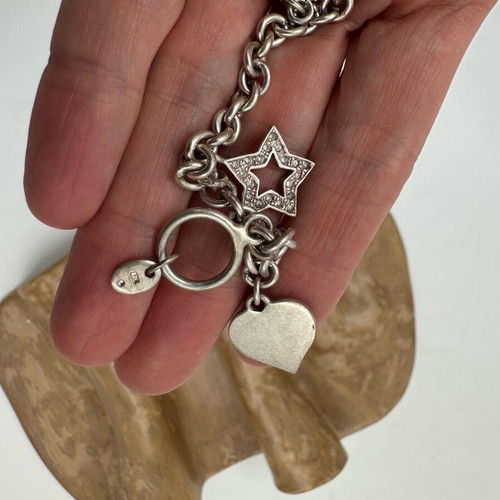 Folli Follie silver 925 bracelet like new with charms