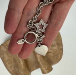 Folli Follie silver 925 bracelet like new with charms
