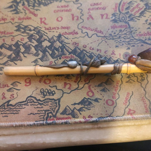 Handmade wooden pipe used with stone and owl decoration