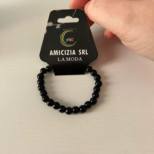 Small bracelet new, black, for children with elastic band