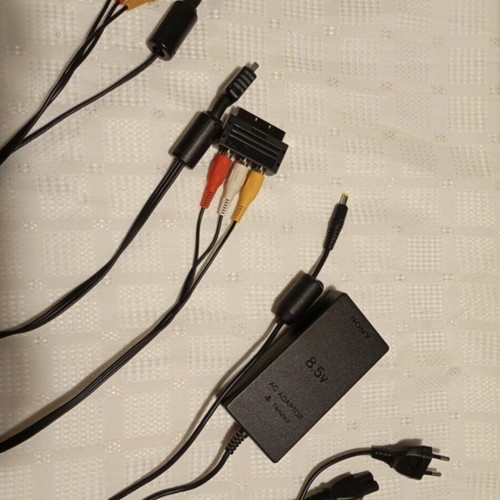 Sony PlayStation 2 Slim like new with cables and controllers