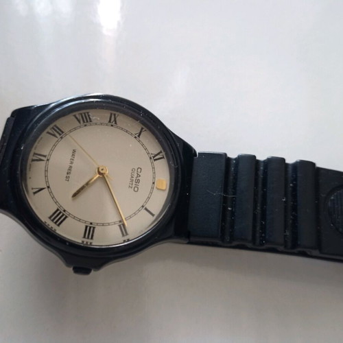 Orient quartz used, black, functional with light scratches
