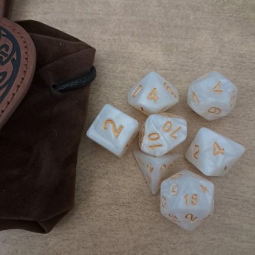 Runic leather dice bag with white marbled D&D dice set