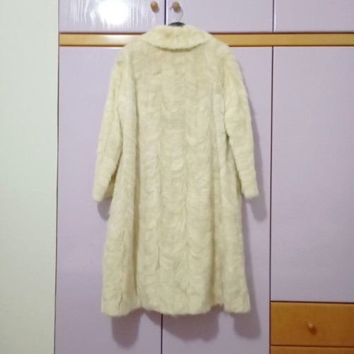 Mink fur coat in off-white and light gray, slightly worn