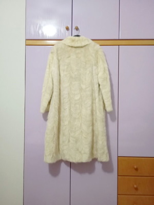 Mink fur coat in off-white and light gray, slightly worn