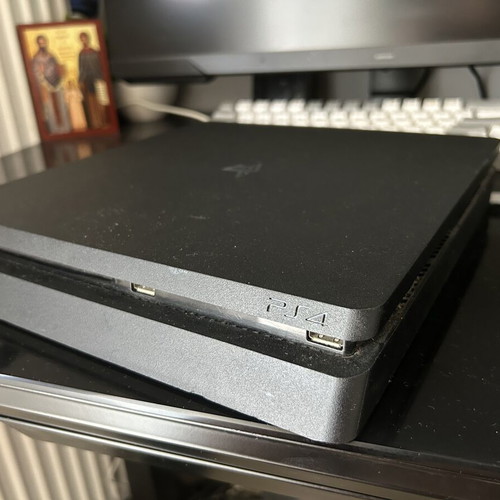PlayStation 4 Slim 1TB like new with 2 controllers and 6 games