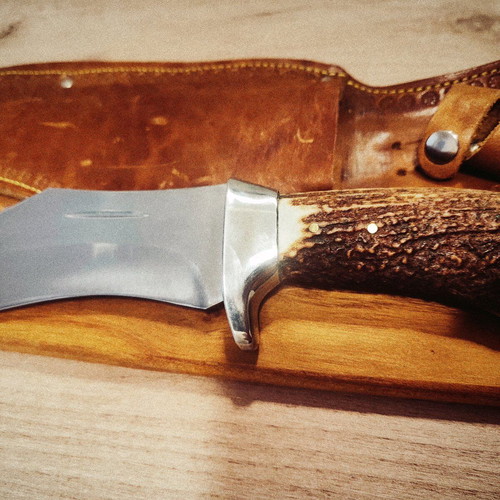 Massive hunting knife new from collection with elk horn handle and calf leather sheath