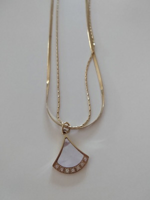 Necklace pendant like new, stainless steel, white and gold