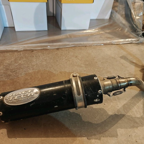 Race Tech exhaust used, no dents, needs painting