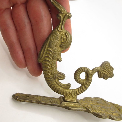 Vintage brass wall hook with mythical sea creature, like new