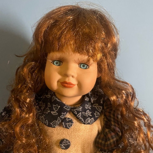 Vintage doll 40cm with base and porcelain face like new