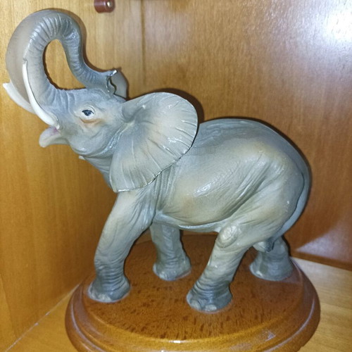 Decorative elephant statue used with wooden base vintage
