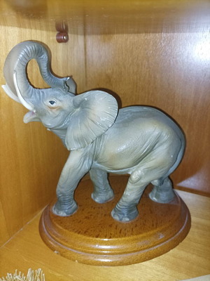 Decorative elephant statue used with wooden base vintage
